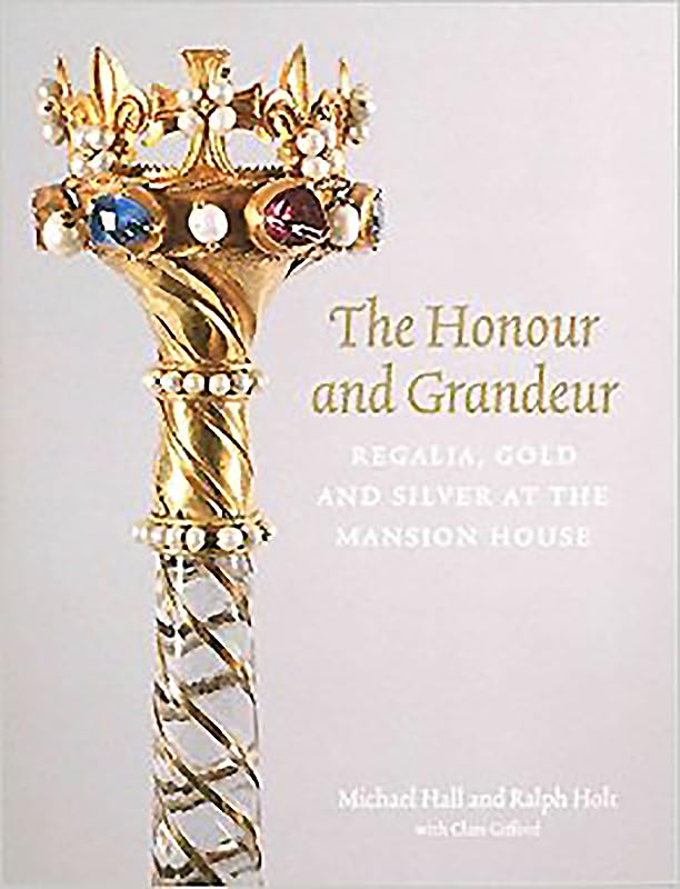 Book cover featuring a gold ceremonial staff with jewels and text.