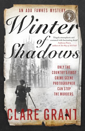 Book cover showing a woman with a vintage camera before a cathedral in snow.