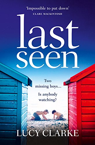 Book cover showing two boys playing on a beach between blue and red huts.