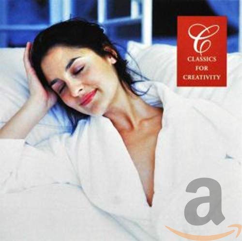 Woman relaxing in bed with a red "Classics For Creativity" CD cover.