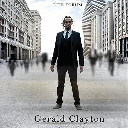 Gerald Clayton album cover: man in suit stands in empty city street.