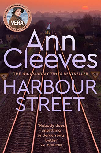 Book cover for Harbour Street by Ann Cleeves featuring railway tracks at sunset.