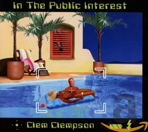 CD cover: man in pool, palm trees, and building with red door.