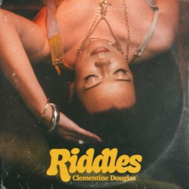 Clementine Douglas album cover, woman with closed eyes in water.