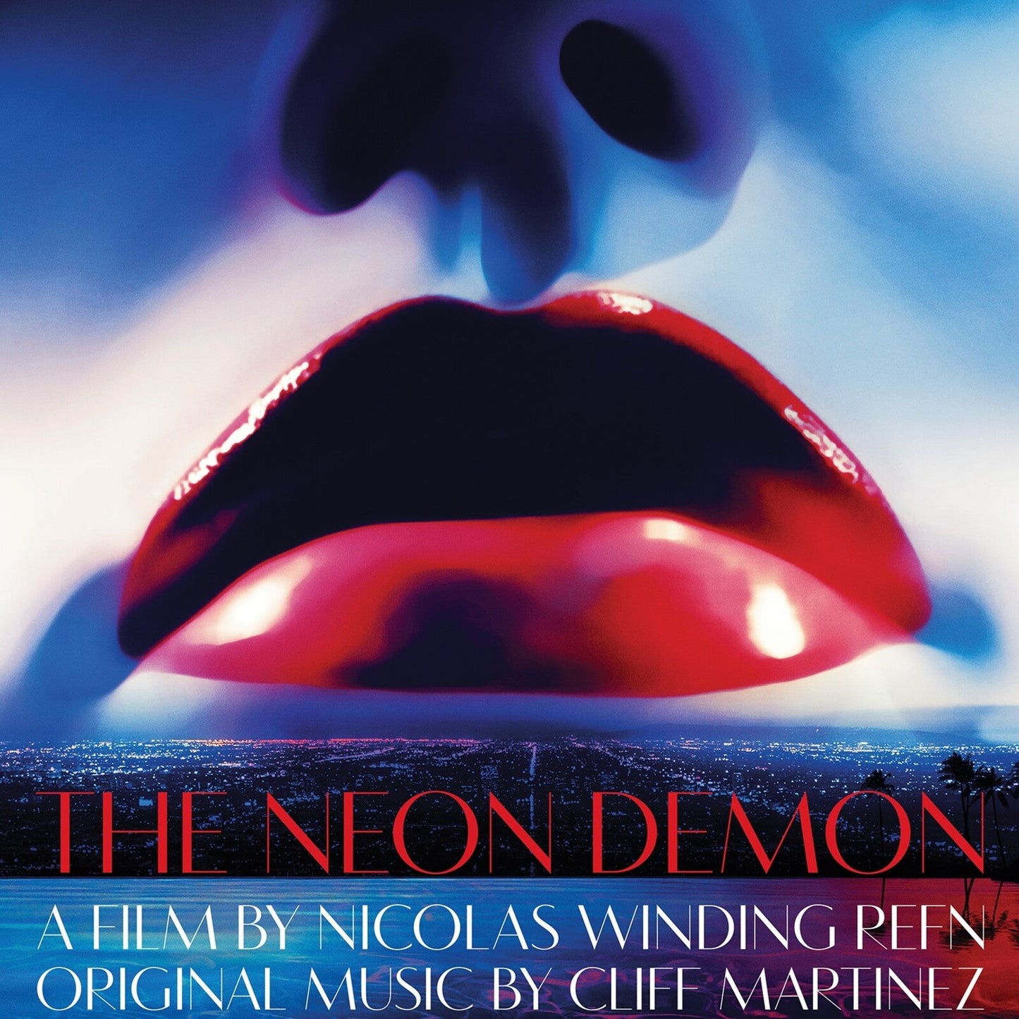 Close-up of red lips with a city skyline reflected within, album cover.
