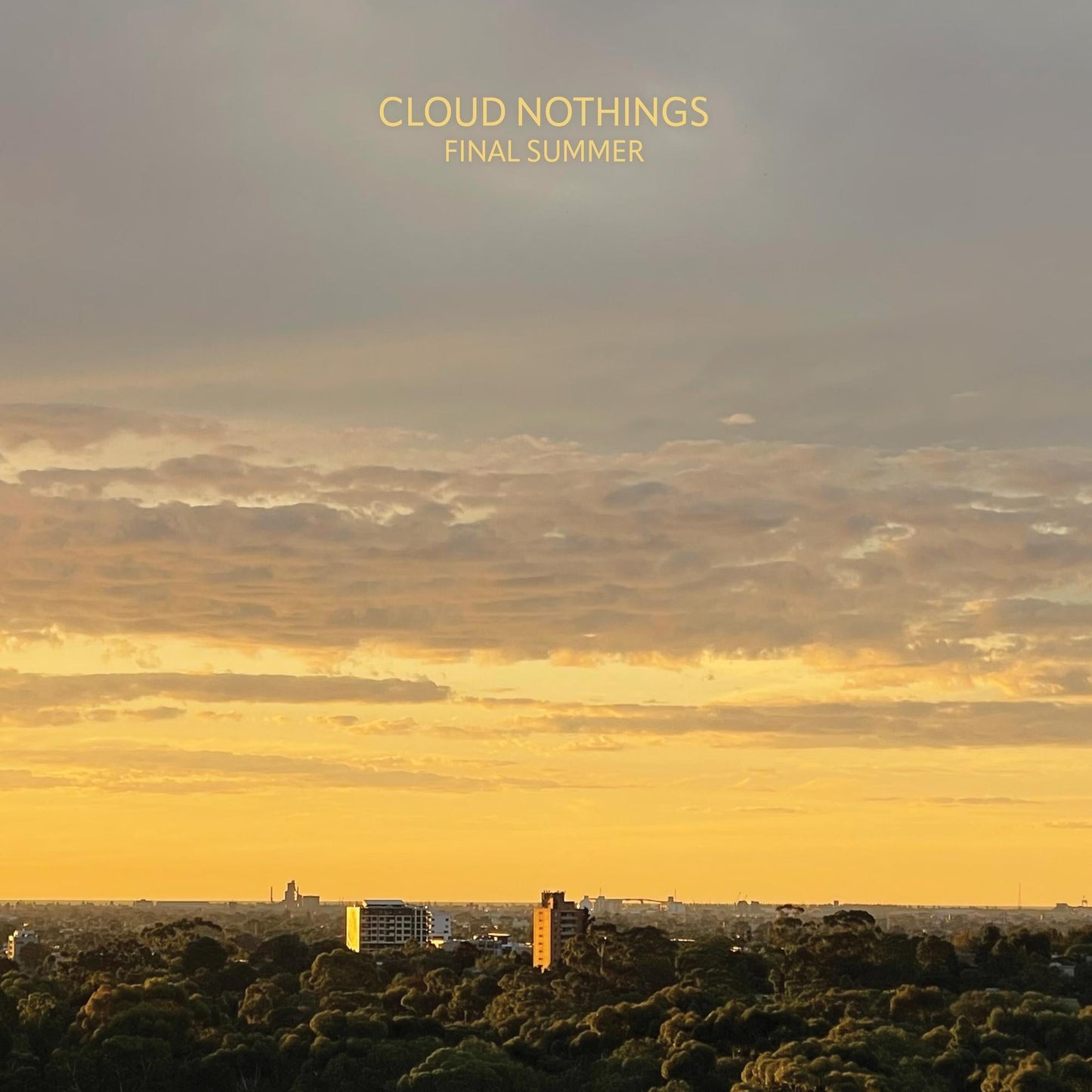 Album cover featuring a sunset over a city skyline with text Cloud Nothings Final Summer.