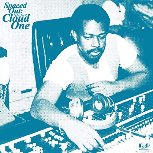 CD cover: man with headphones at a mixing console, blue tone.