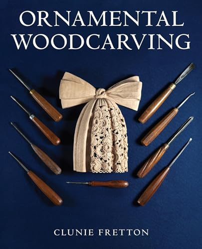 Book cover with wood carving tools and a carved floral design.