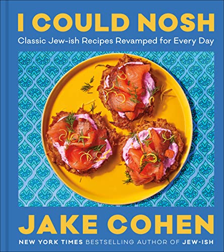 Cookbook cover with salmon potato latkes and bold yellow and blue text.
