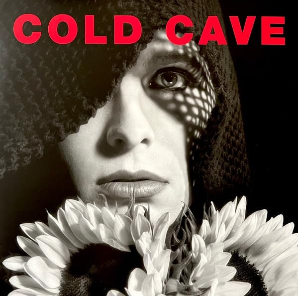 Black and white album cover featuring a person in a hood holding sunflowers.