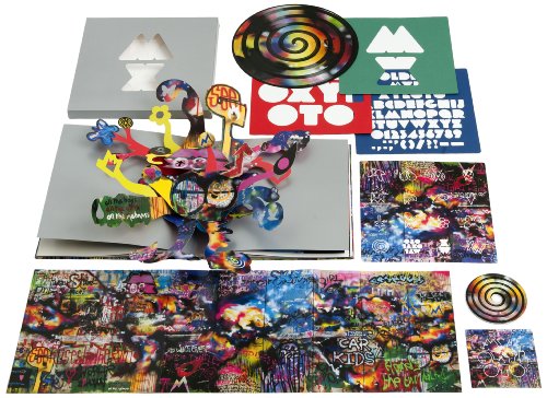 Coldplay Mylo Xyloto vinyl box set contents including pop-up book, artwork, and vinyl discs.