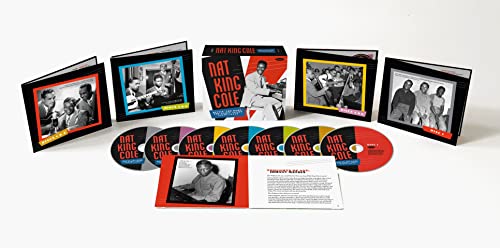 Nat King Cole CD box set with multiple discs and booklet.
