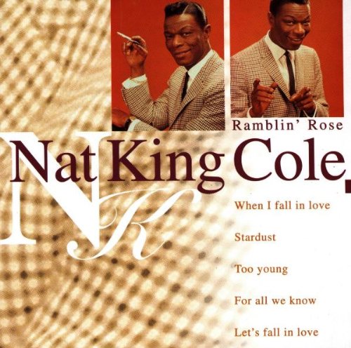 CD cover featuring Nat King Cole in a suit, with song titles listed.