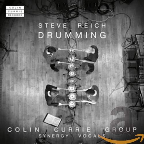 Black and white album cover featuring drummers playing multiple percussion instruments.