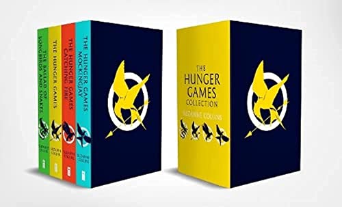 Four paperback books in colorful spines and navy blue and yellow covers with Mockingjay symbol.