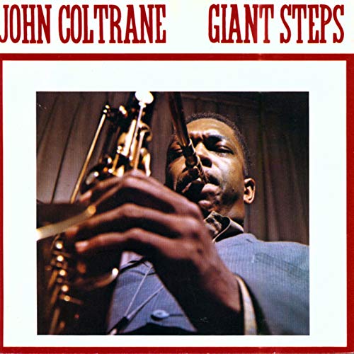 John Coltrane playing saxophone on the album cover, "Giant Steps".
