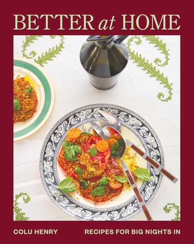 Cookbook cover with food photography: tomato salad, wine, and tableware.