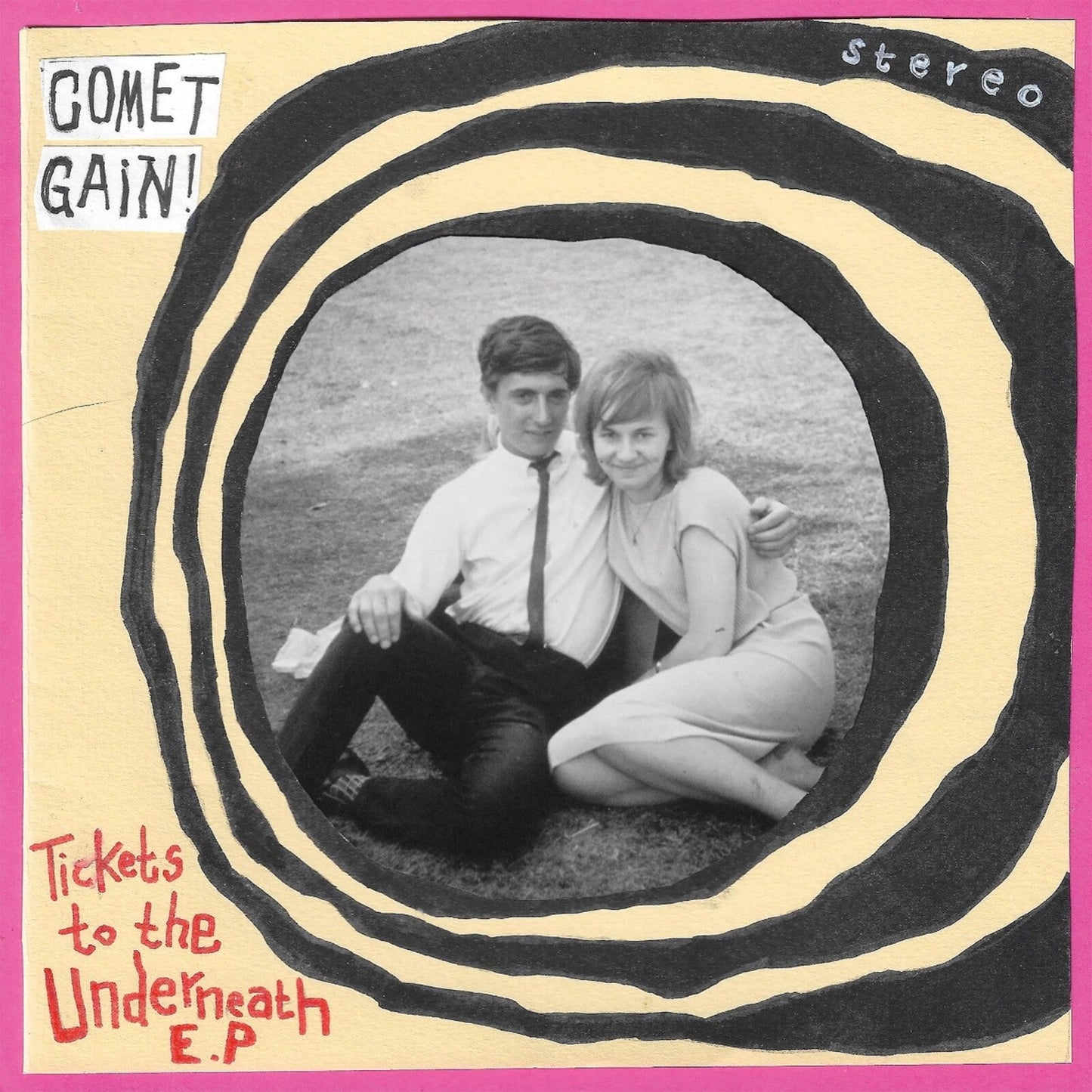 Record cover with black spiral framing a vintage photo of a couple.