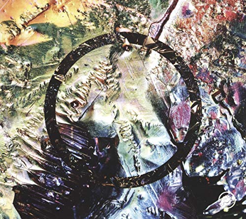 Abstract album cover with a central circular design and textured paint.