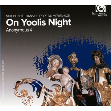 CD cover: Nativity scene with sculpted figures and blue snowflake design.