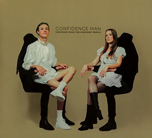 CD cover with a man and woman seated in dark chairs.