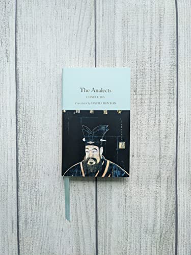 Book cover for "The Analects" with a portrait of Confucius.