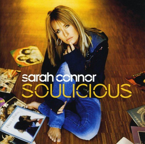 Sarah Connor album cover, “Soulicious,” featuring artist seated on a wooden floor.