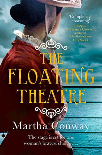 Book cover: woman in red coat, title "The Floating Theatre" in gold.
