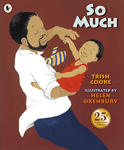 A father in a white shirt and tie holding a baby in a red dress.