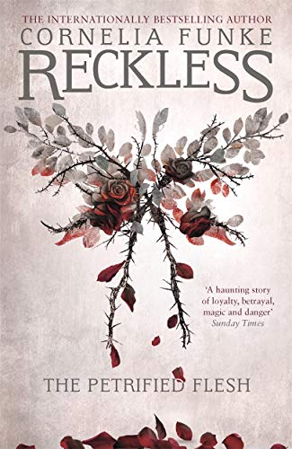 Book cover: "Reckless I: The Petrified Flesh" with roses and thorns.