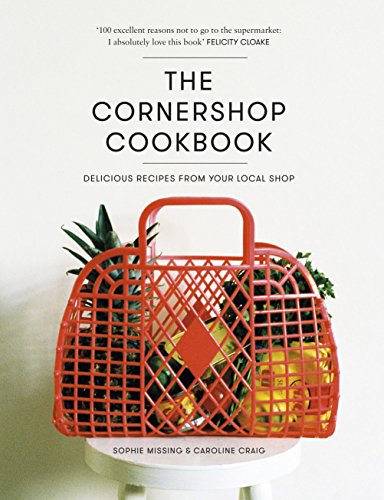 Cookbook cover with red basket of fruit and bold title text.