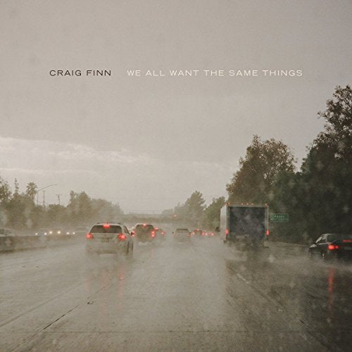 Craig Finn album cover: rainy highway with cars, muted colors.