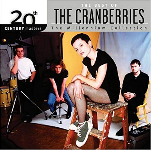 Cranberries’ “Millennium Collection” CD cover featuring the band in a studio setting.