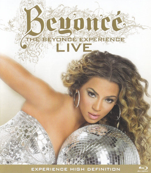 Beyoncé on Blu-ray cover, posing with curly hair and a sparkly dress.