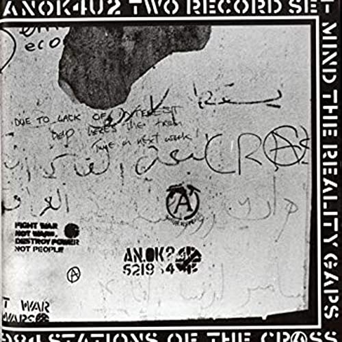 Black and white vinyl record cover with handwritten text and anarchist symbols.