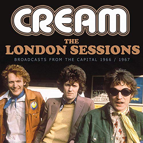 Cream album cover featuring band members in a vintage photograph.