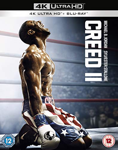 Creed 2 Blu-ray cover featuring Michael B. Jordan kneeling in a boxing ring.