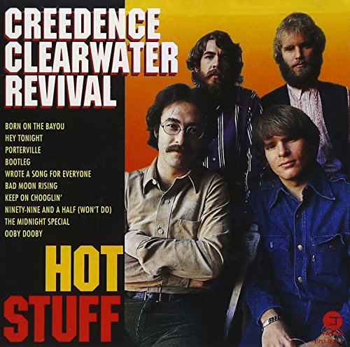 Creedence Clearwater Revival album cover featuring the band members against a yellow and black background.