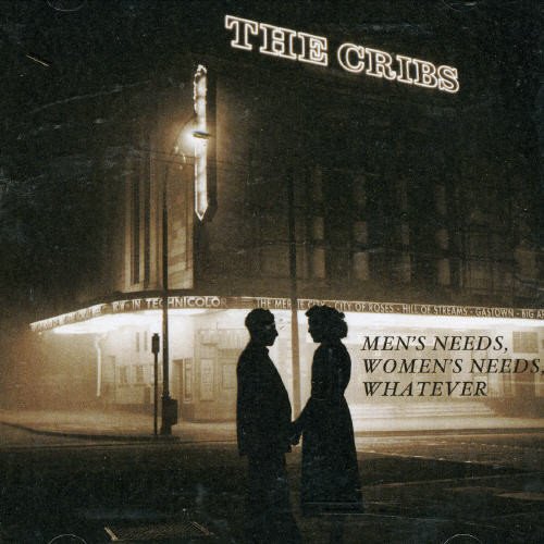 Album cover for The Cribs, showing a couple in front of a theater.