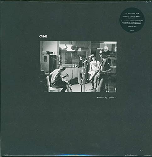 Black and white vinyl cover showing a band playing instruments in a studio.
