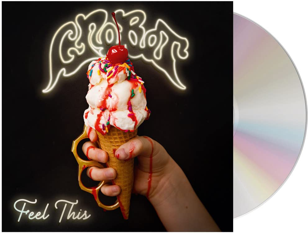 Crobot album cover: hand holding ice cream cone with brass knuckles.
