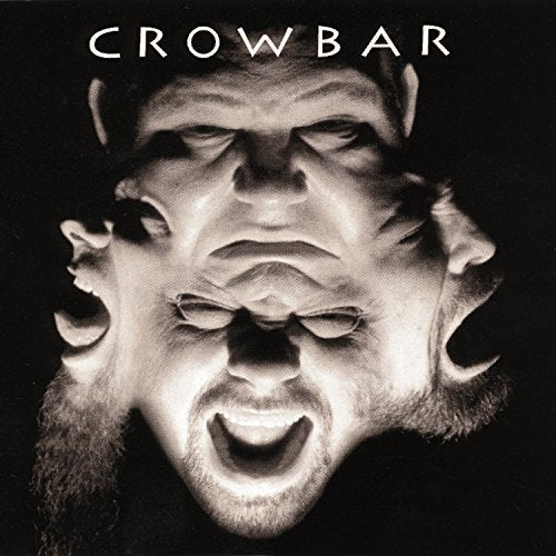 Black and white album cover with distorted, overlapping faces.