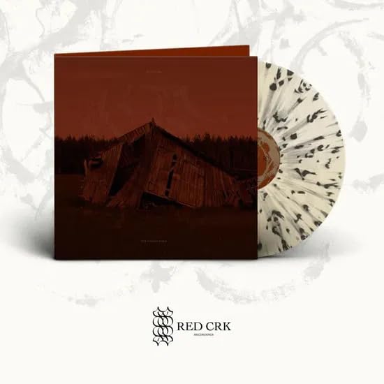 Cult of Luna album cover showing a dark barn and milky clear black speckled vinyl.