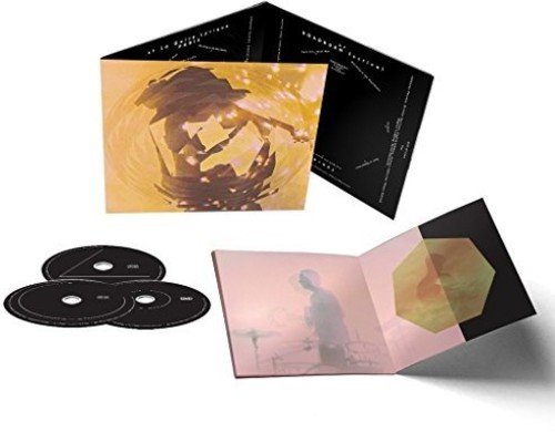 Cult Of Luna album packaging with CDs, featuring abstract, golden imagery.