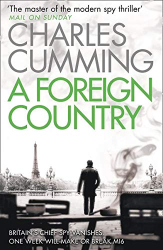 Book cover: man walking towards Eiffel Tower, Paris, spy thriller.