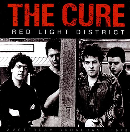 Black and white photo of The Cure band members, album cover.