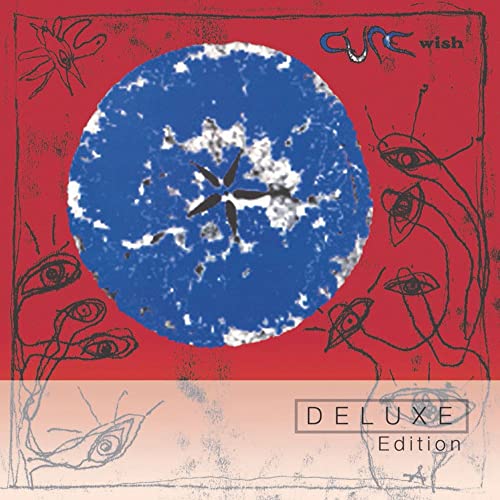 The Cure’s “Wish” album cover: red background with blue orb and eyes.