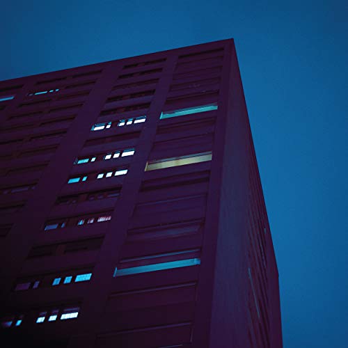 CD cover art: a tall, purple building against a blue sky.