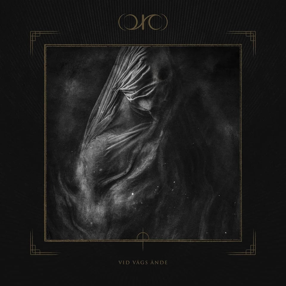 Dark album cover featuring a ghostly figure with flowing hair.