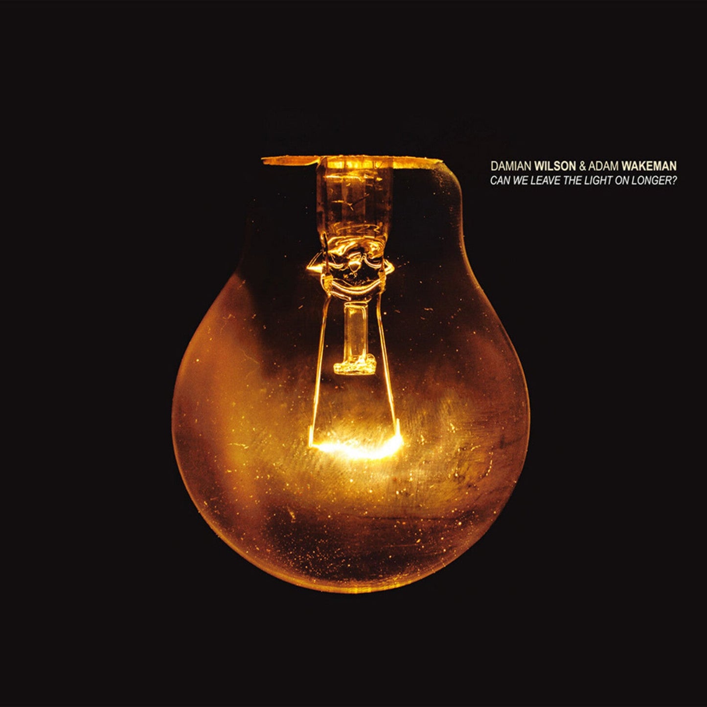 Album cover: glowing lightbulb against a dark background, text above.